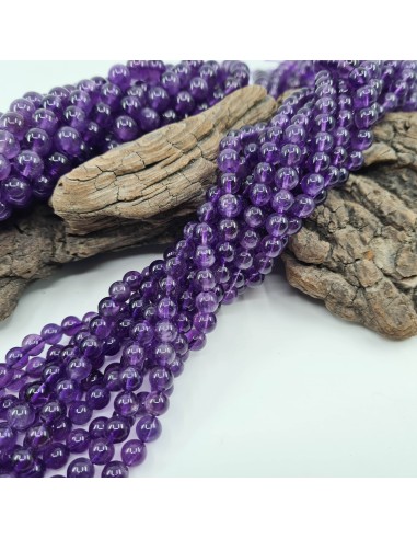 Améthyste, fil de perles rondes en pierre...